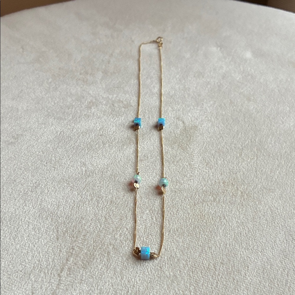 Magnolia Gold Necklace with Blue Accents